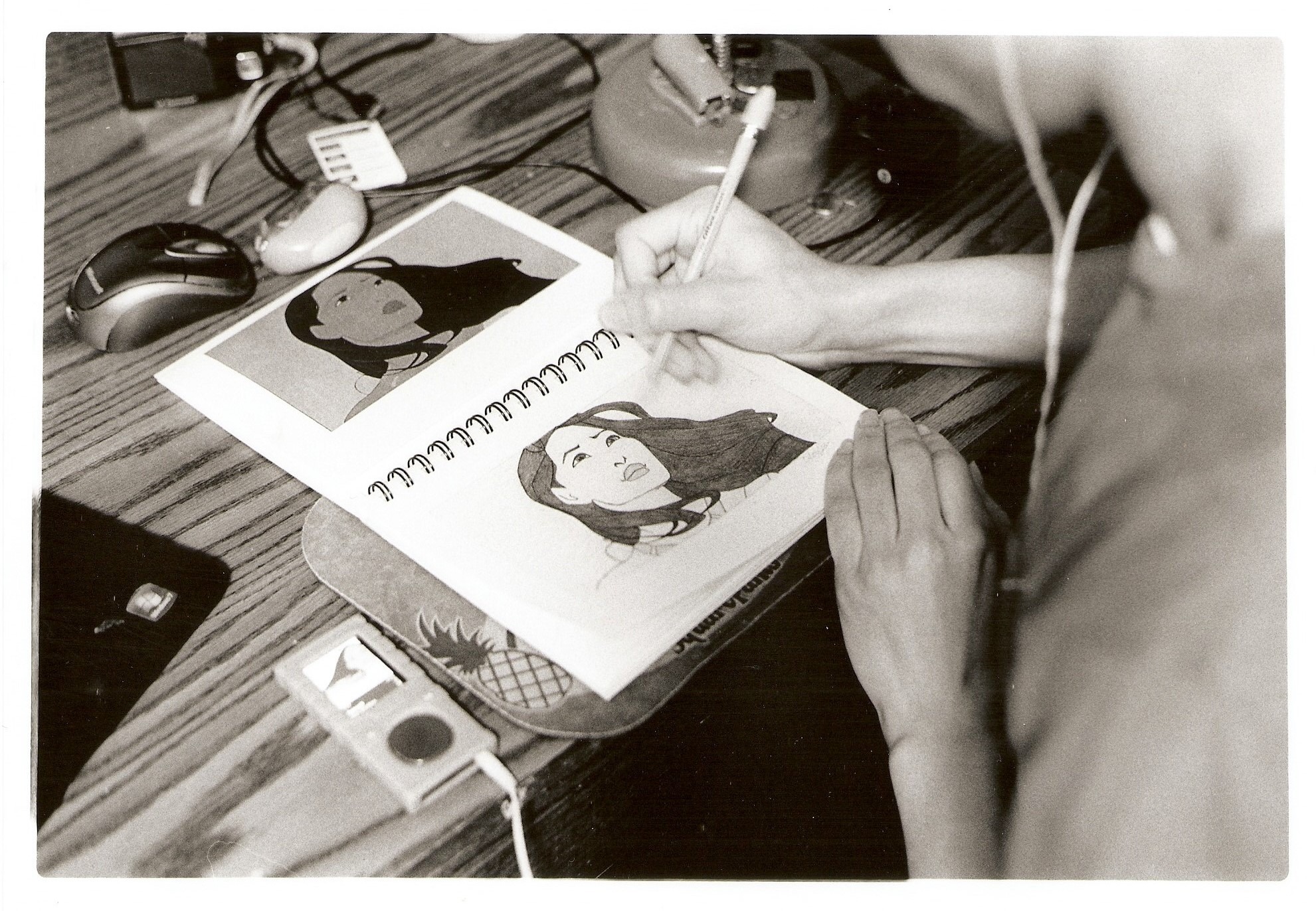 Jaire drawing a screenshot of Disney's Pocahontas.
